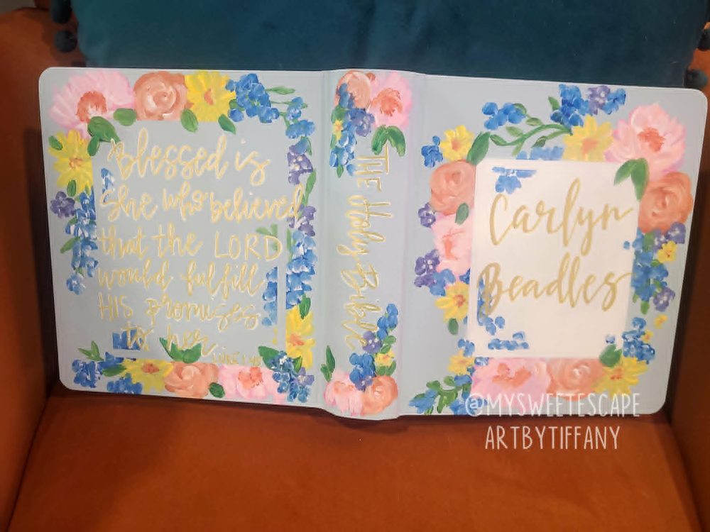 Hand-painted Bible cover for Carlyn Beadles with Luke 1:45 verse and pastel florals