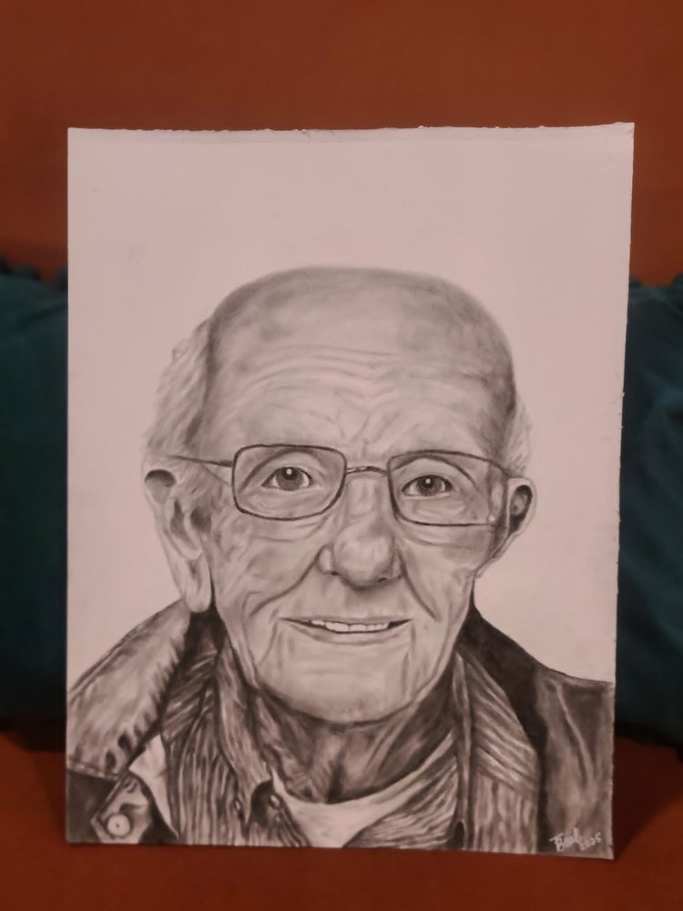 Detailed graphite portrait of an older man with glasses