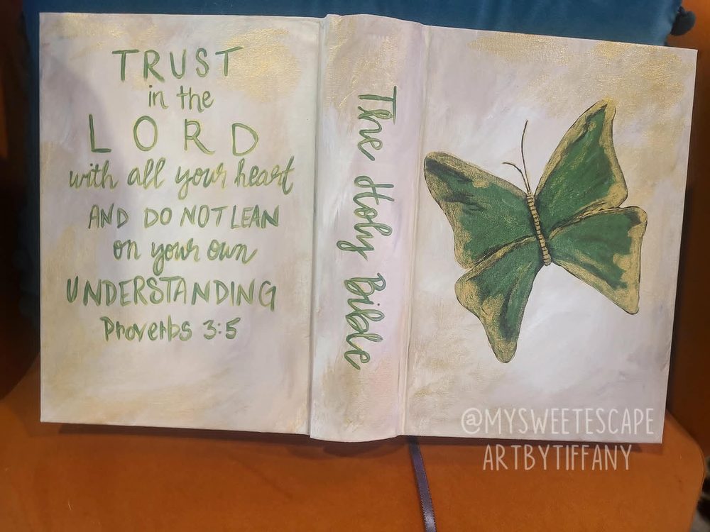 Hand-painted Bible cover with Proverbs 3:5 verse and a green and gold butterfly