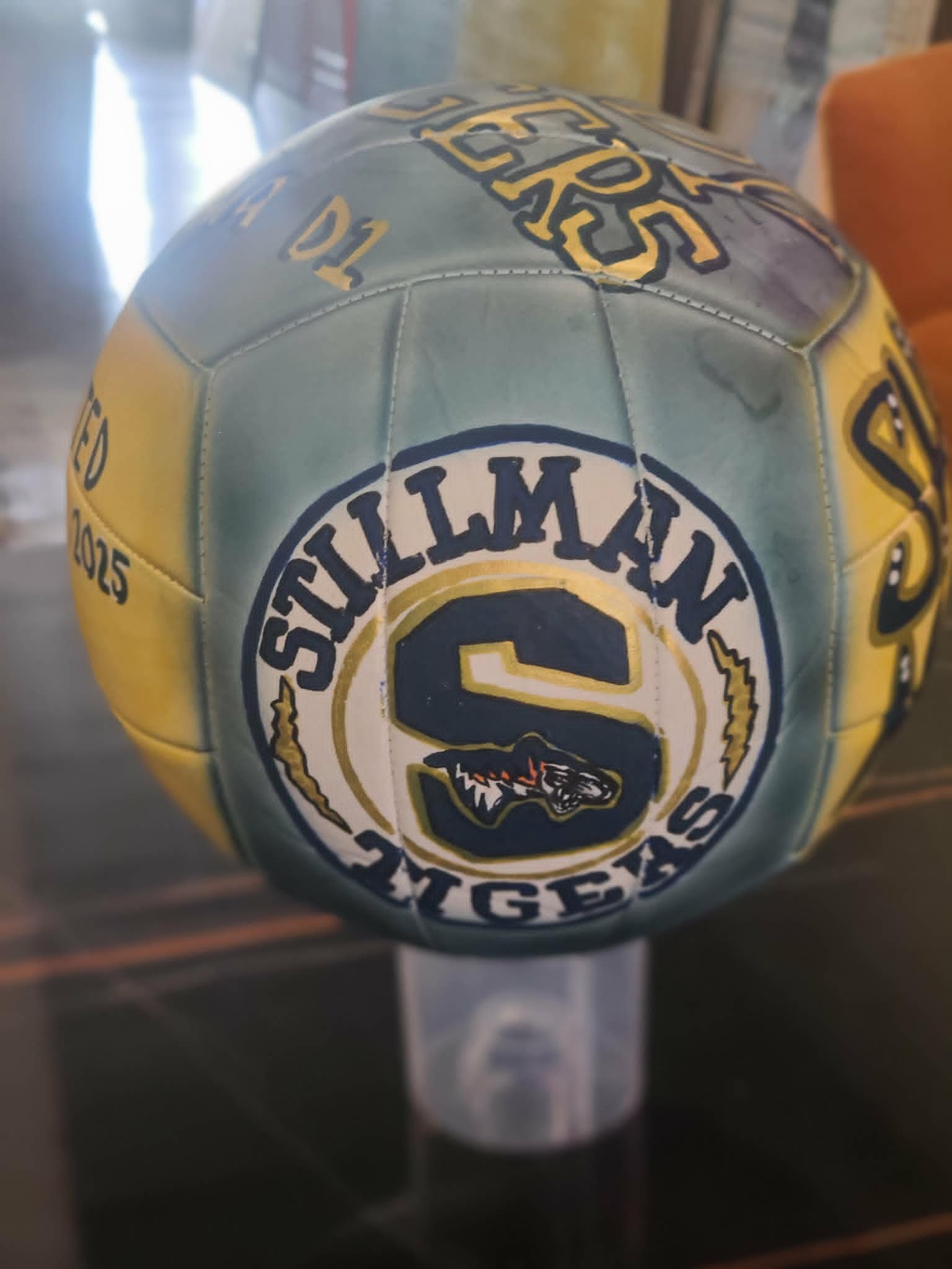 Hand-painted Stillman Tigers volleyball in navy and gold with circular team crest, tiger logo, and 'Class of 2025' detail