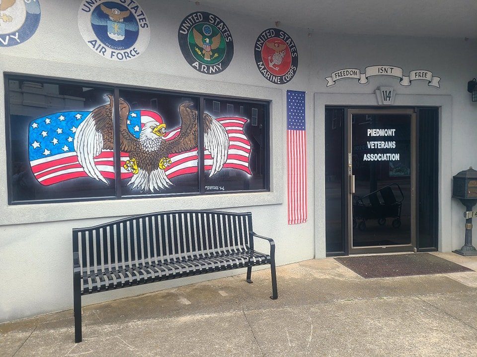 Painted patriotic eagle and American flag windows for the Piedmont Veterans Association